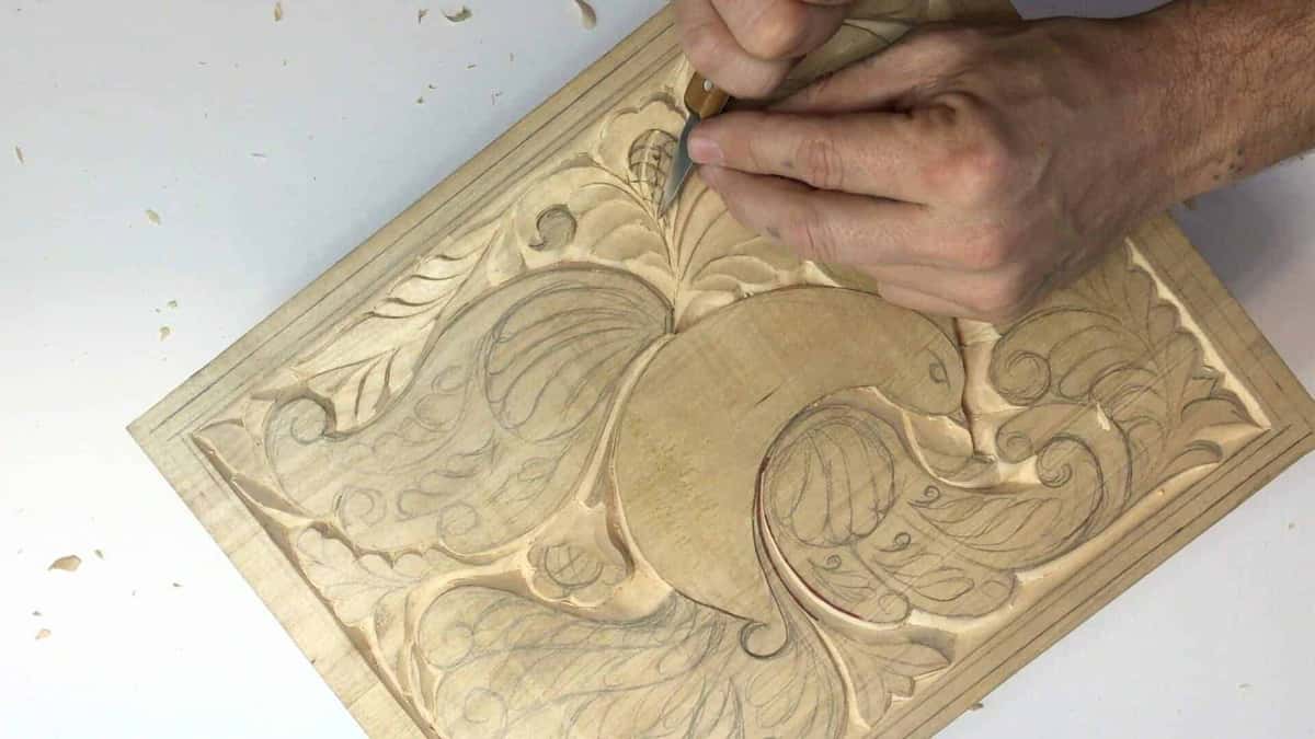 Small knife, loose curls, white tabletop
