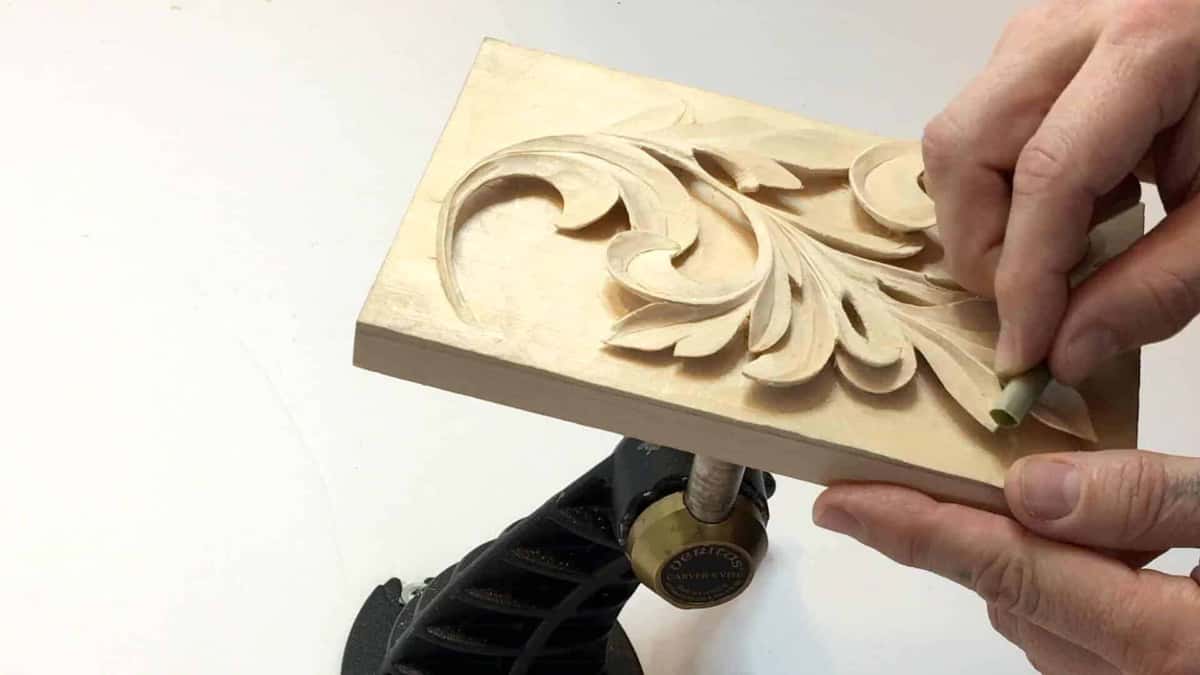 Carving blank held up, sawn edge showing underneath