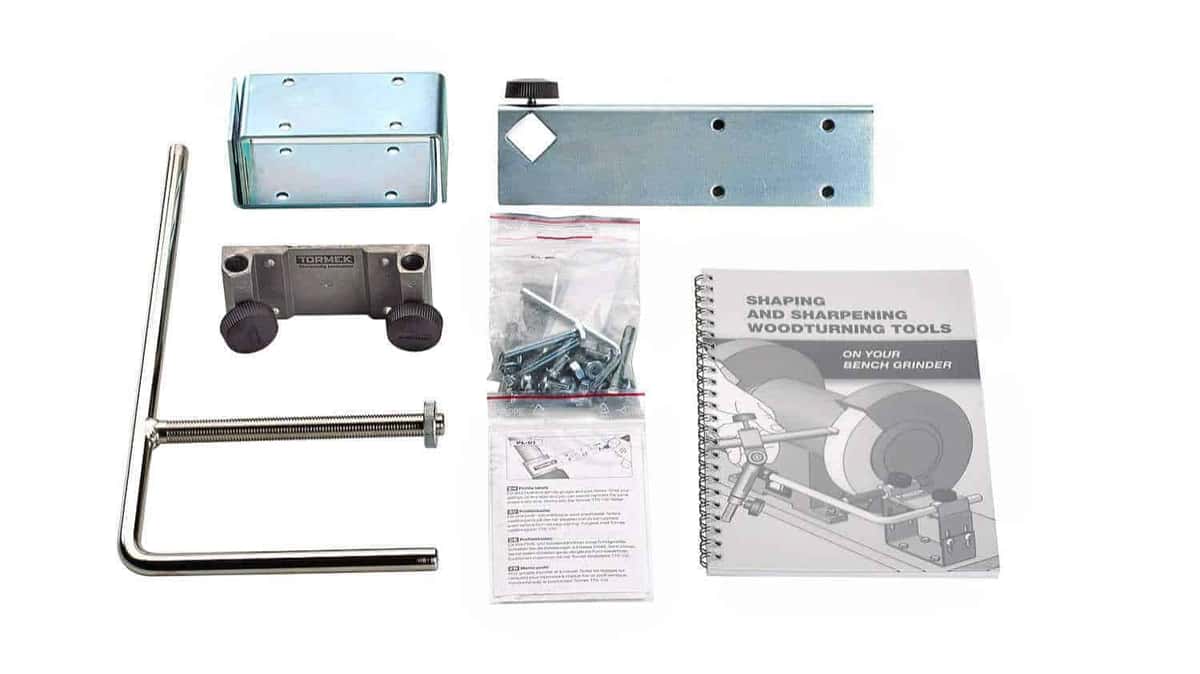 Zinc brackets, loose screws and a thin sharpening booklet