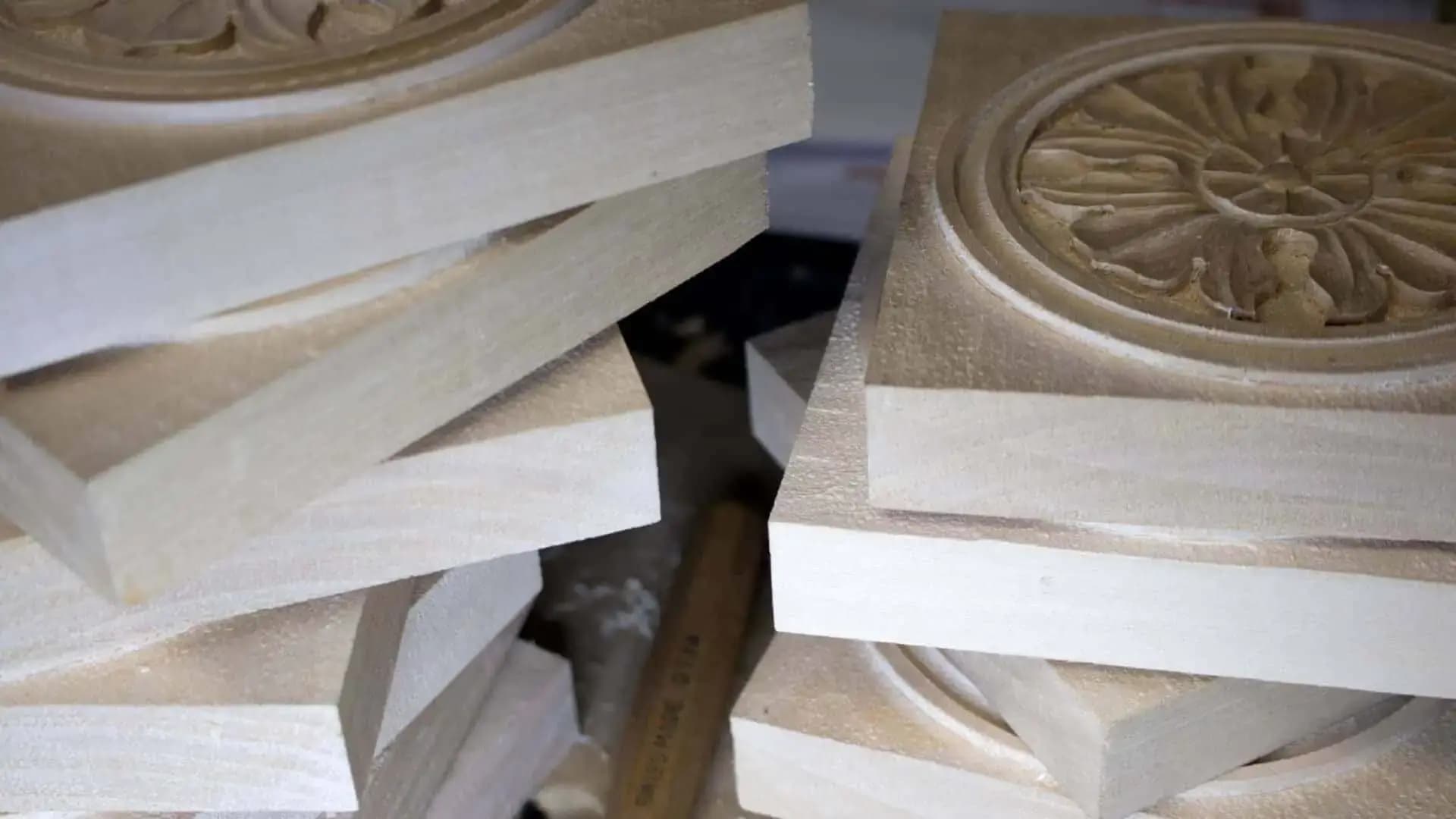 What makes wood less dense?