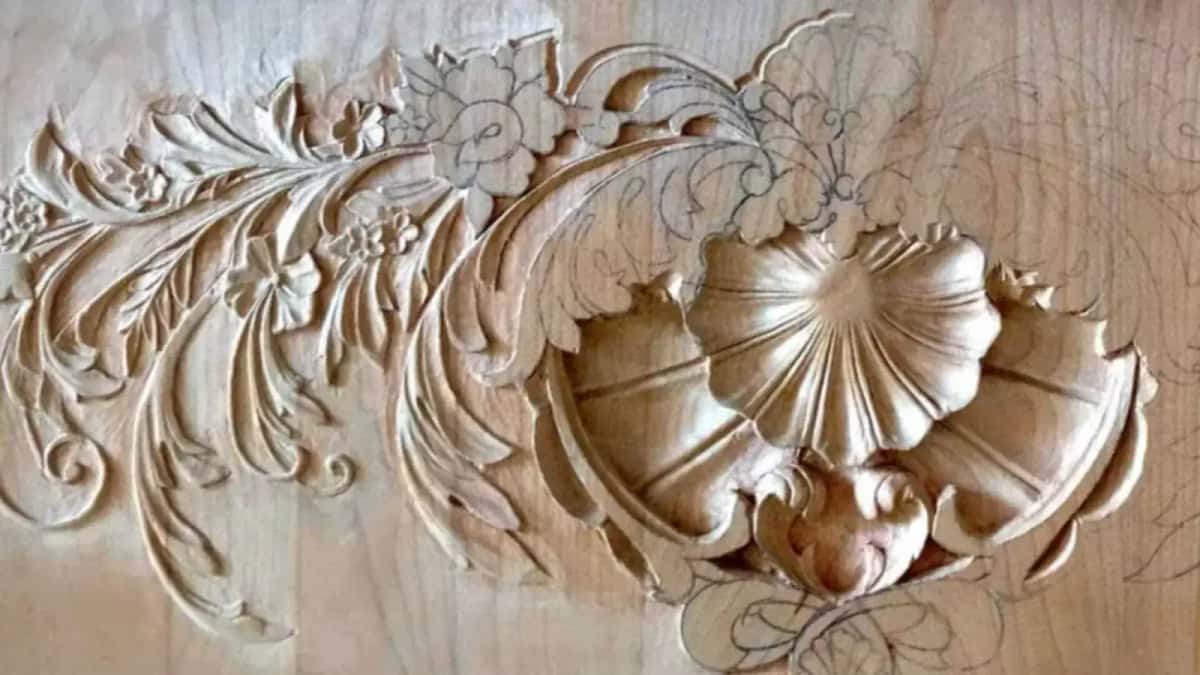 Half the shell and acanthus carved, the rest continuing as bare pencil line